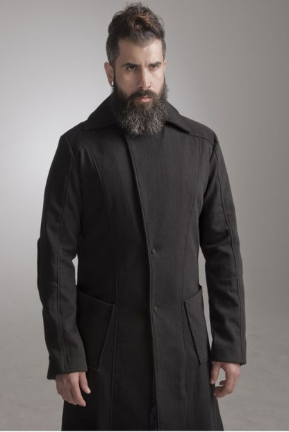The Black Trench Coat by Disorder, is made from high quality black wool fabric, fully lined and it is handcrafted by our expert tailors in our Birmingham, UK studio.
