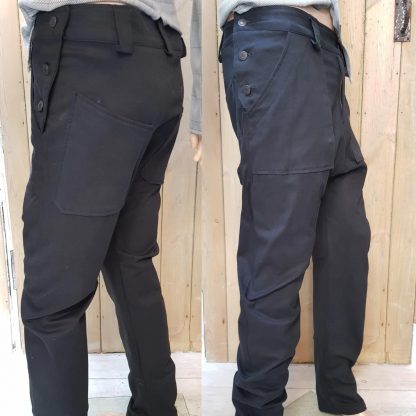 Black Dungaree Trousers by Disorder. We handcraft these limited edition, sustainable and ethically made trousers, in our Birmingham, UK studio.